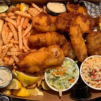 Hand-battered cod, fries, macaroni salad and coleslaw from Tower Café, Estevan, Saskatchewan